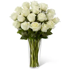 send 18 pcs. white ecuadorian roses in vase to manila
